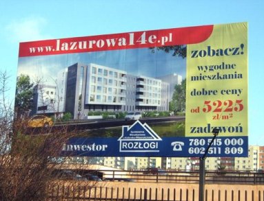 baner naciągniety na konstrukcję  tablicy reklamowej